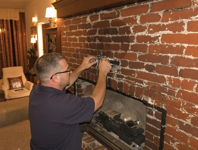 French Valley Chimney Sweep expert fixing a fireplace in French Valley, CA